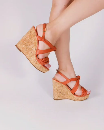 Beautiful wedge heeled cork women shoes in leather tan color, closure in the back for comfort and elegance.