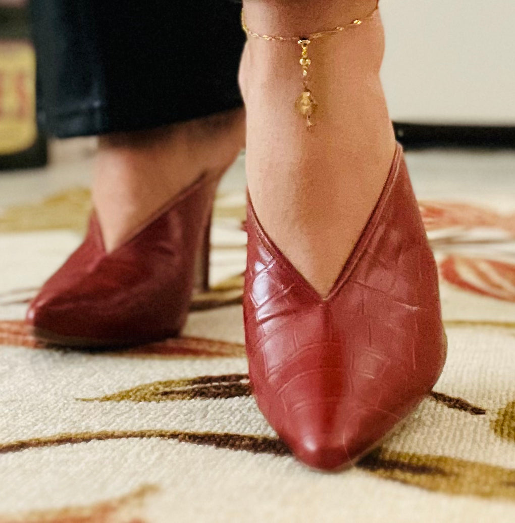 Red crock mule mid heeled shoes in red.
